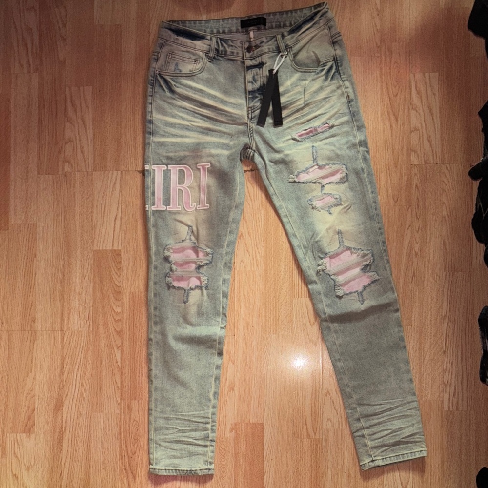 AMIRI Light Blue Skinny Jeans with Pink Patch and Embroidered Logo